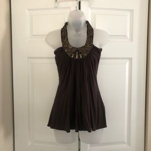 Sleeveless Sky top with halter around the neck
